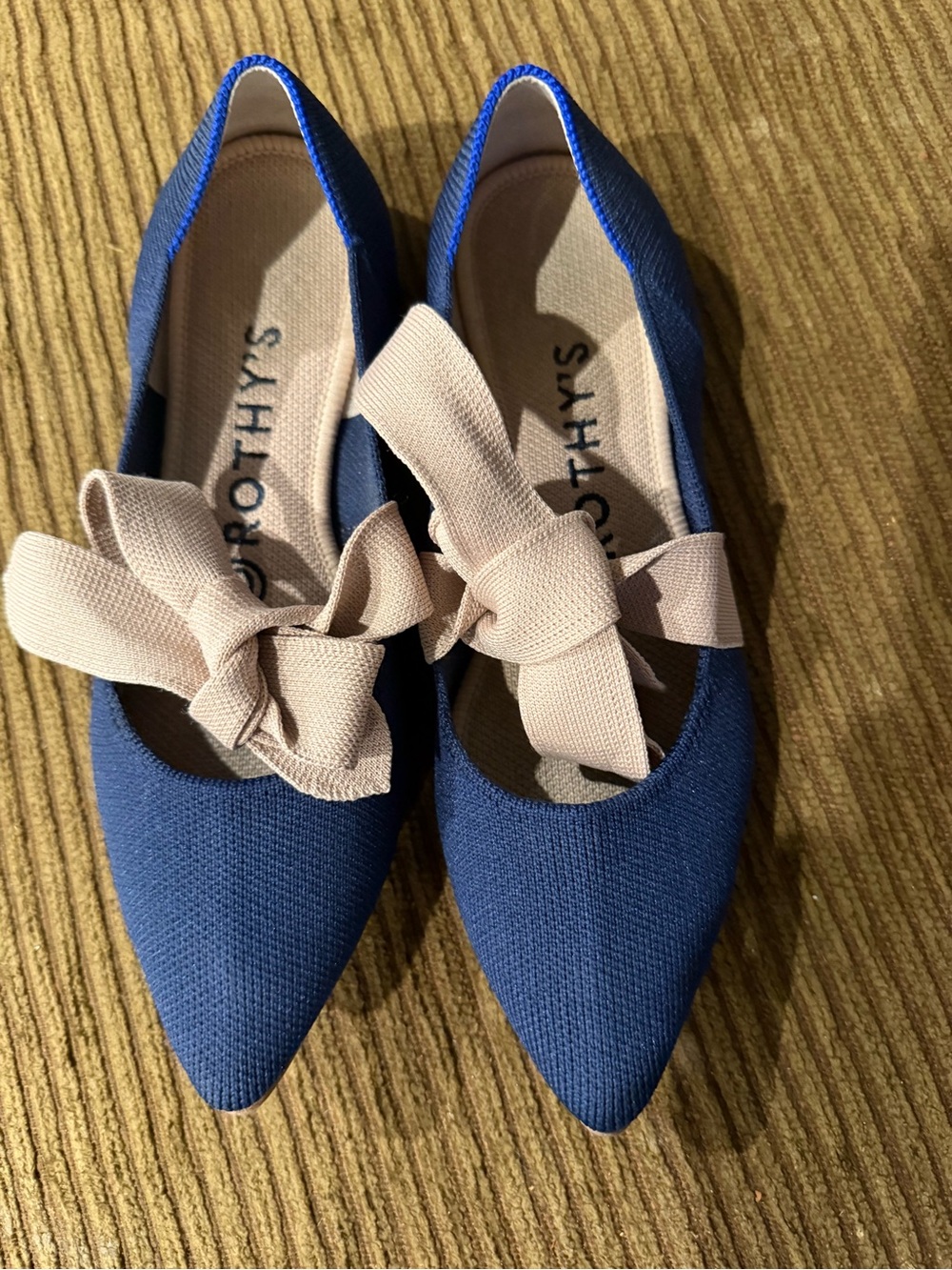 Rothy's Pointed Flat in Navy with Blush Bow